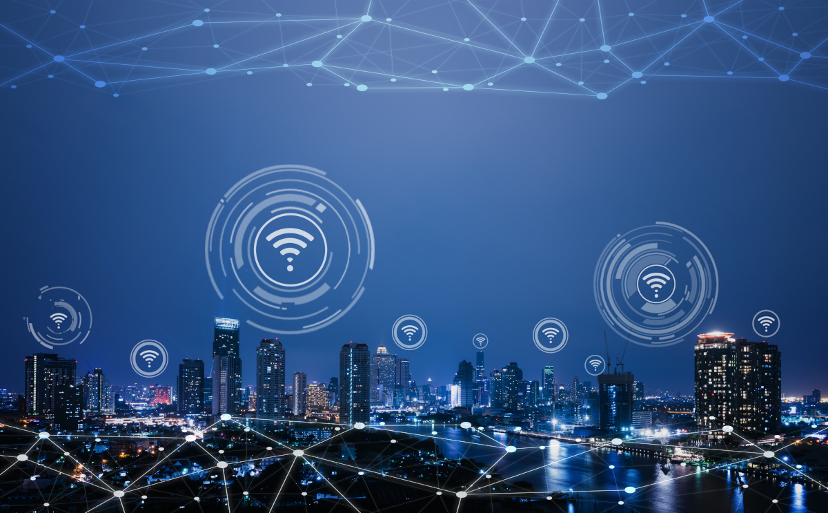 Wifi signals and connectivity concept icons over city skyline.